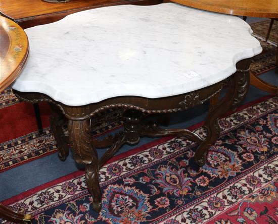 A late 19th century Continental marble topped centre table, W.104cm